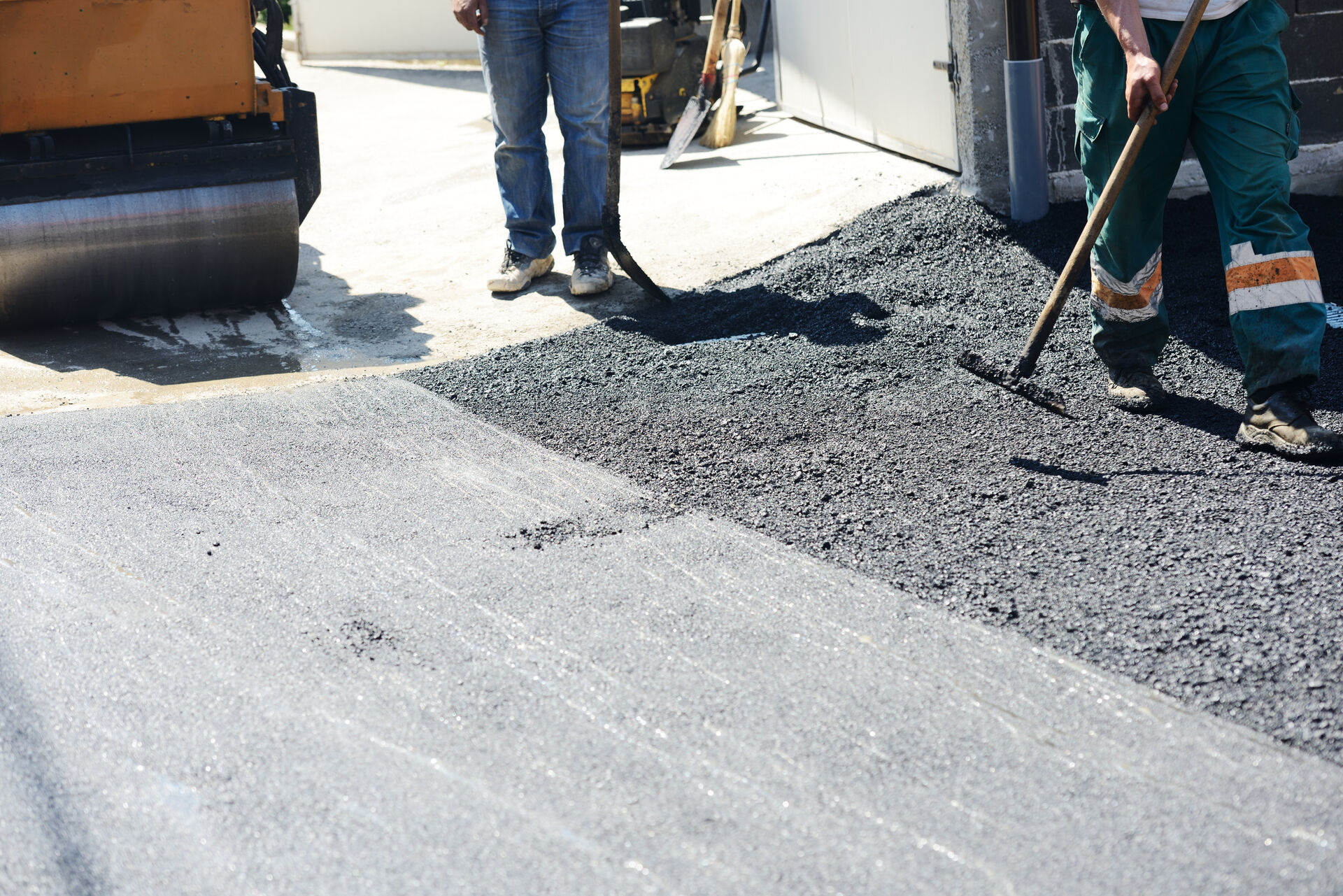 Blackland Asphalt crew assessing and paving a commercial lot in Dallas–Fort Worth, TX — Blackland Asphalt